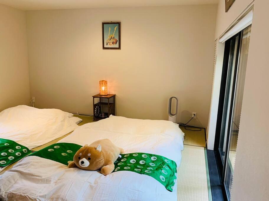 كيوتو ゲストハウス至の宿 Shibainu-Themed Guesthouse المظهر الخارجي الصورة